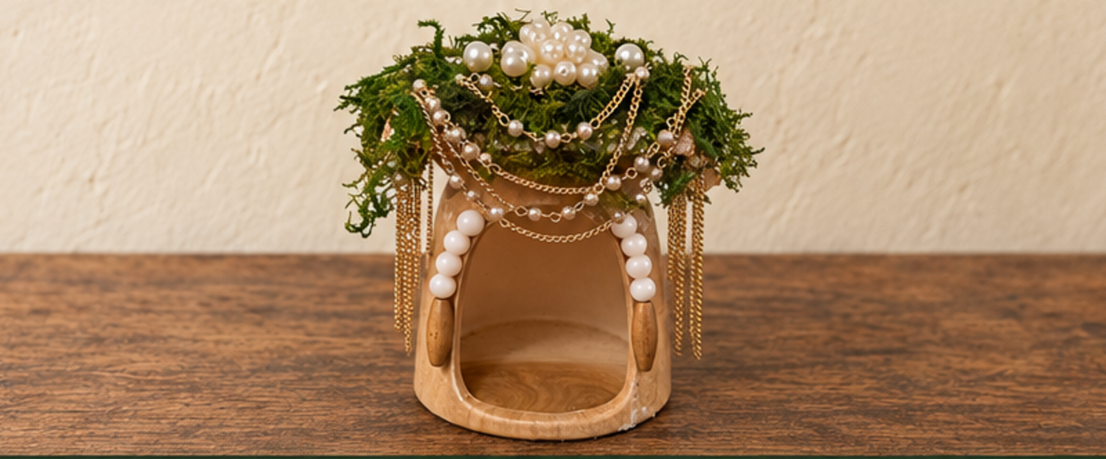 The current fairy house with pearl doorway beads and a pearl earring roof ornament
