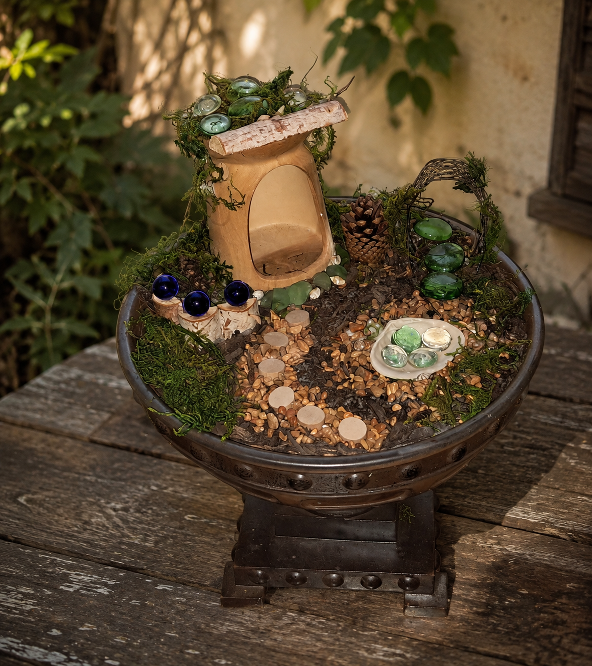 An evolving fairy world built in a thrifted pedestal bowl