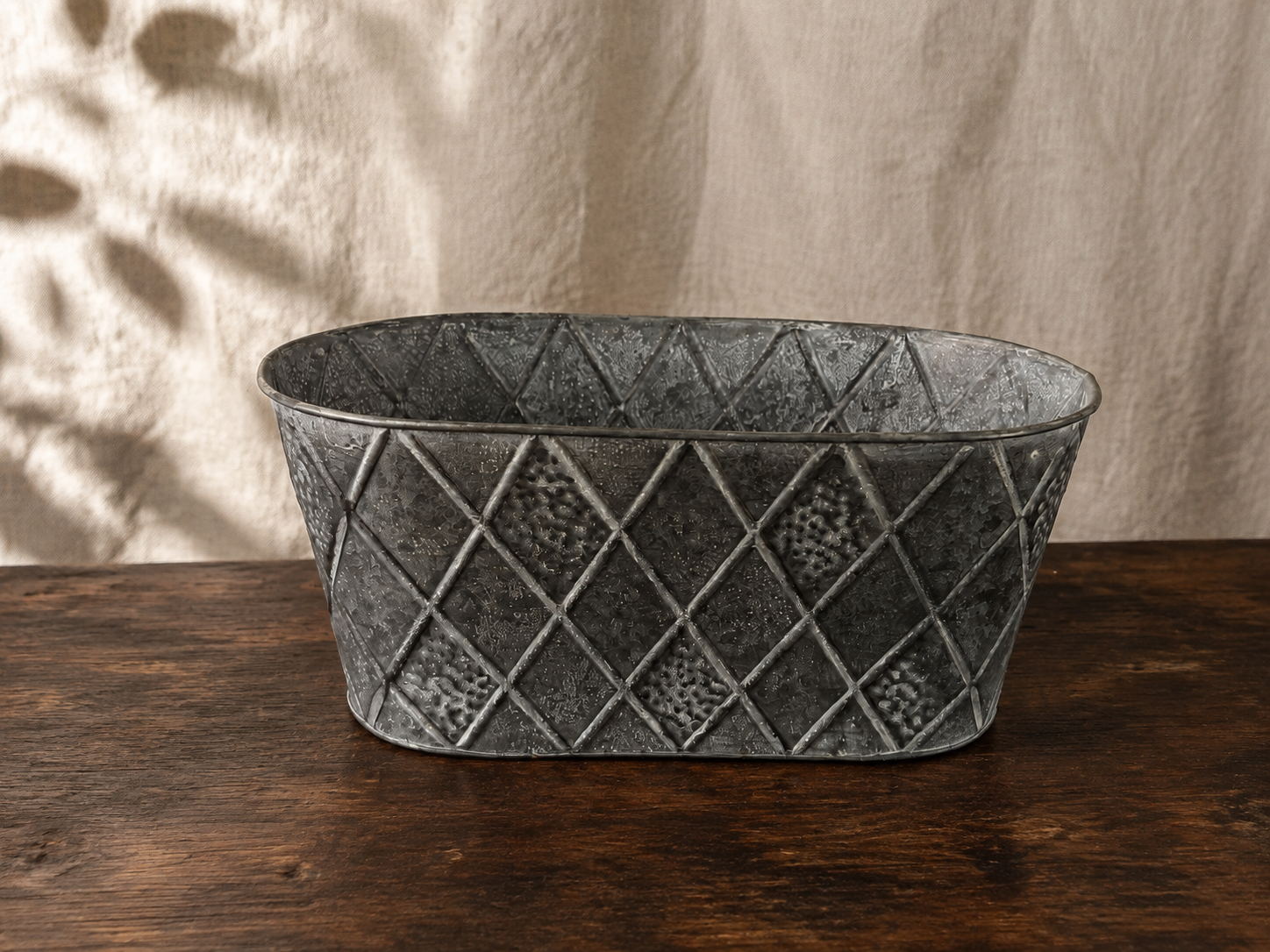A patterned galvanized container for a future fairy world