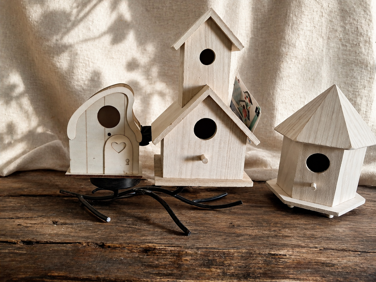 Five unfinished wooden houses